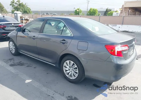 2013 Toyota Camry Hybrid Le z USA, uszkodzony, nr VIN 4T1BD1FK7DU073372